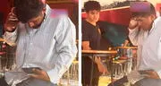 Hombre en estado de ebriedad confunde un vaso lleno de cerveza con su celular